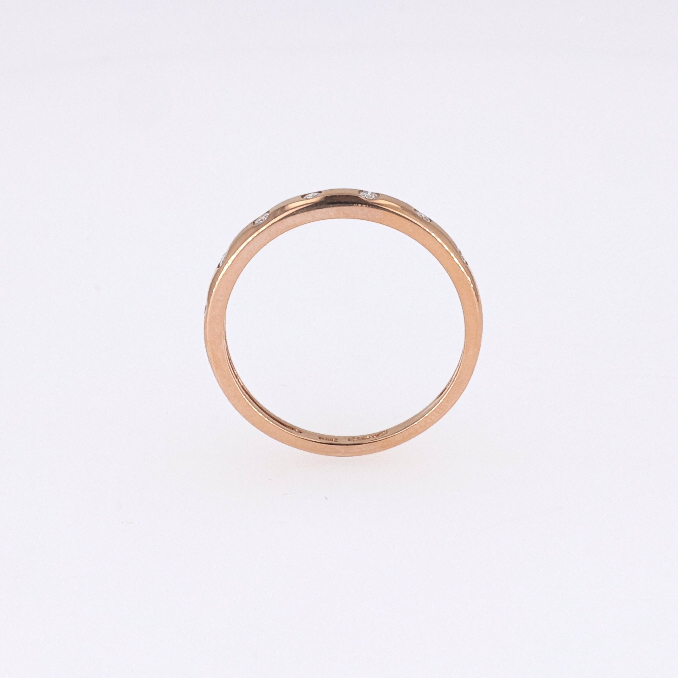 0.11 CTW DEW Round Near-Colorless Moissanite Band in 14K Rose Gold