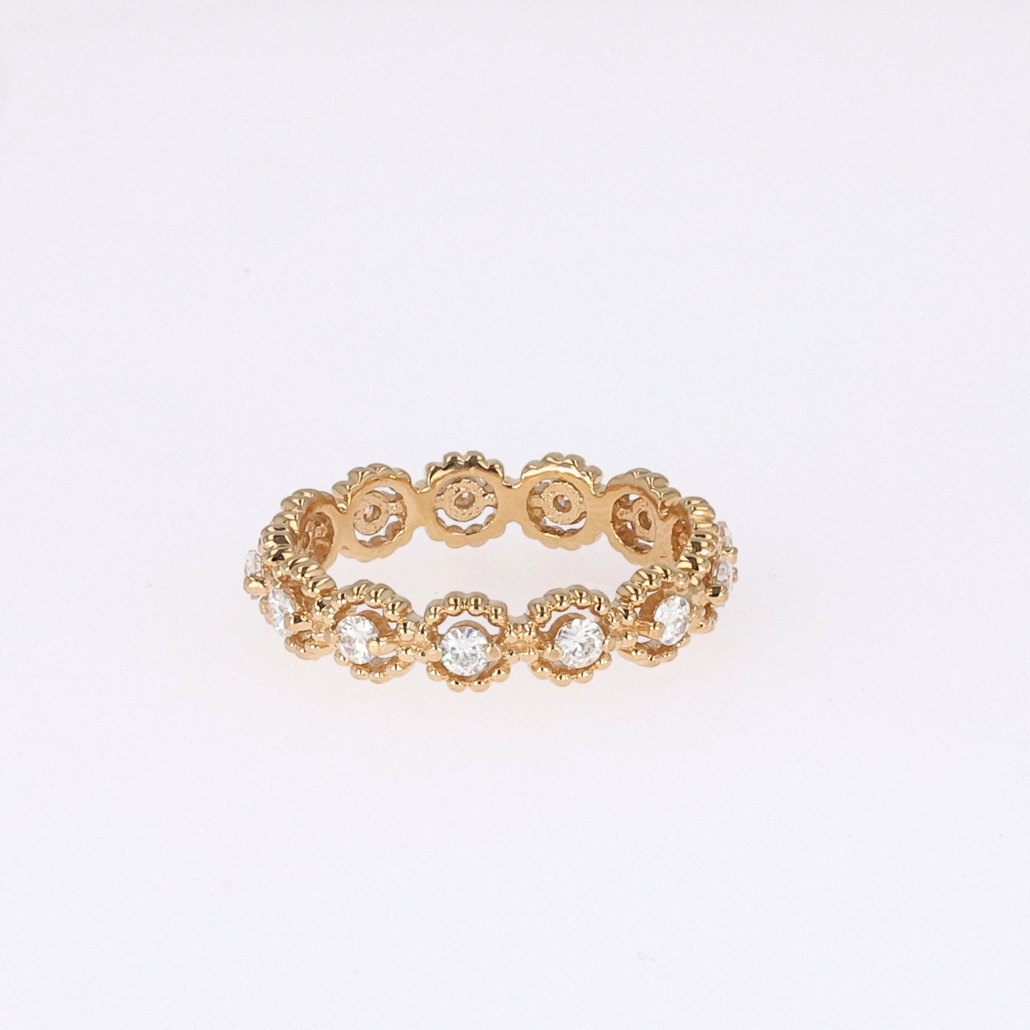 0.59 CTW DEW Round Near-Colorless Moissanite Band in 14K Yellow Gold