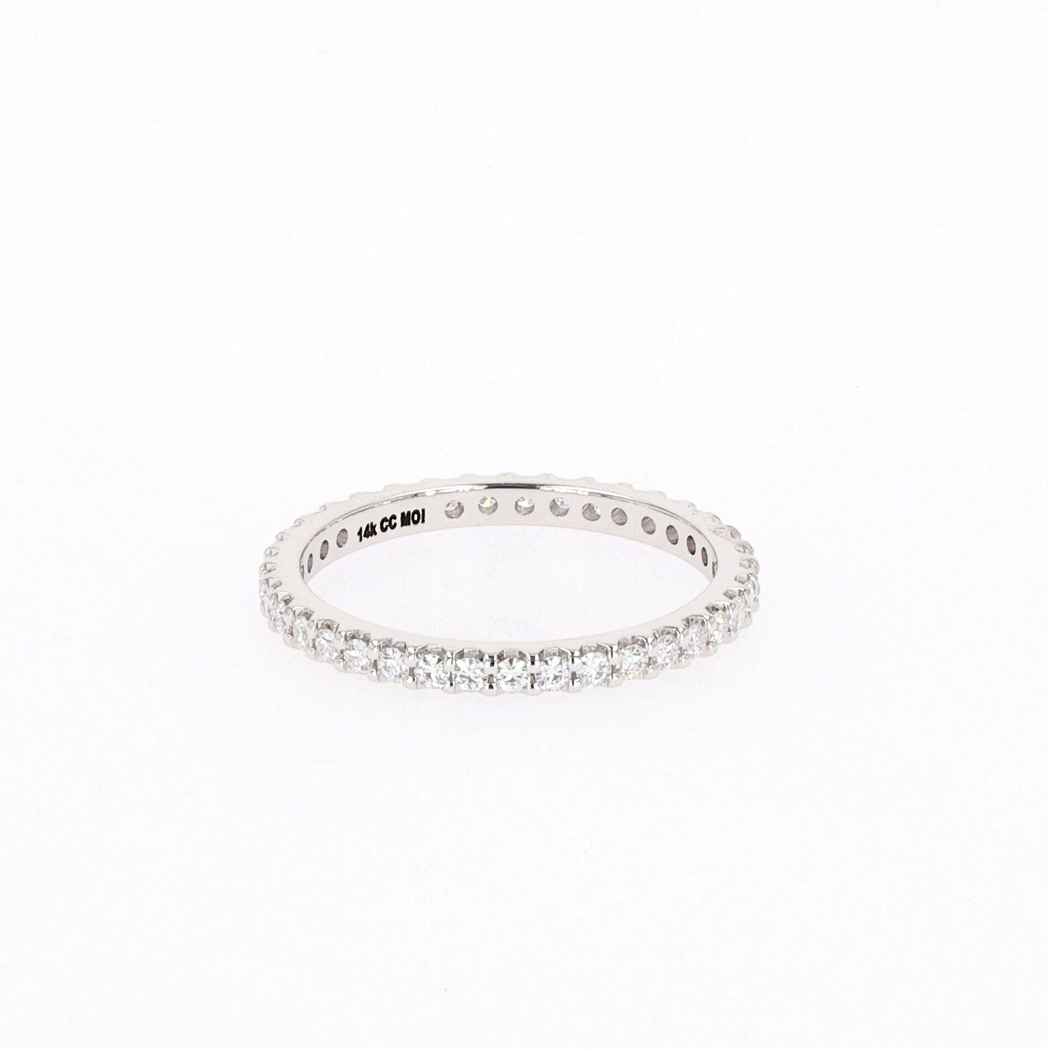0.57 CTW DEW Round Near-Colorless Moissanite Eternity Ring in 14K White Gold