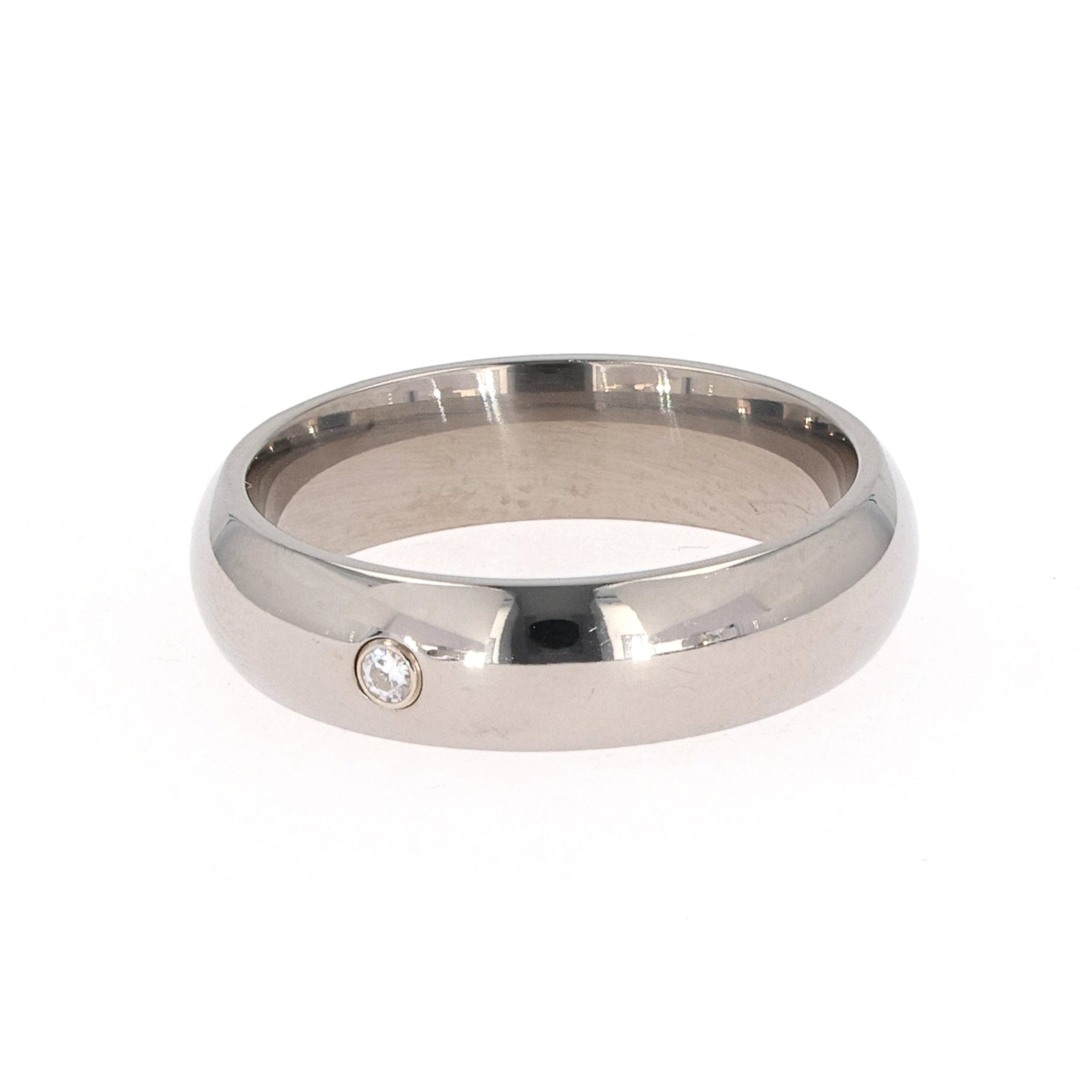 0.03 CTW DEW Round Moissanite Bezel Comfort Fit Wedding Band in Titanium