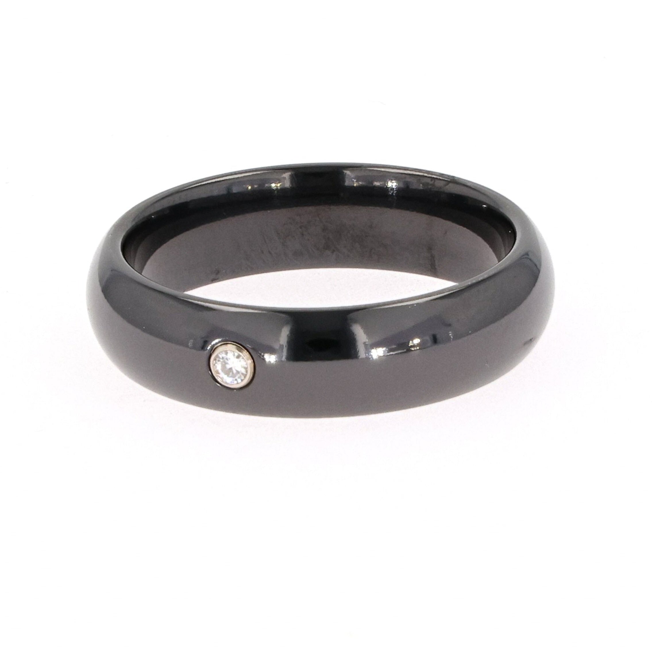 0.03 CTW DEW Round Moissanite Bezel Comfort Fit Wedding Band in Black Titanium