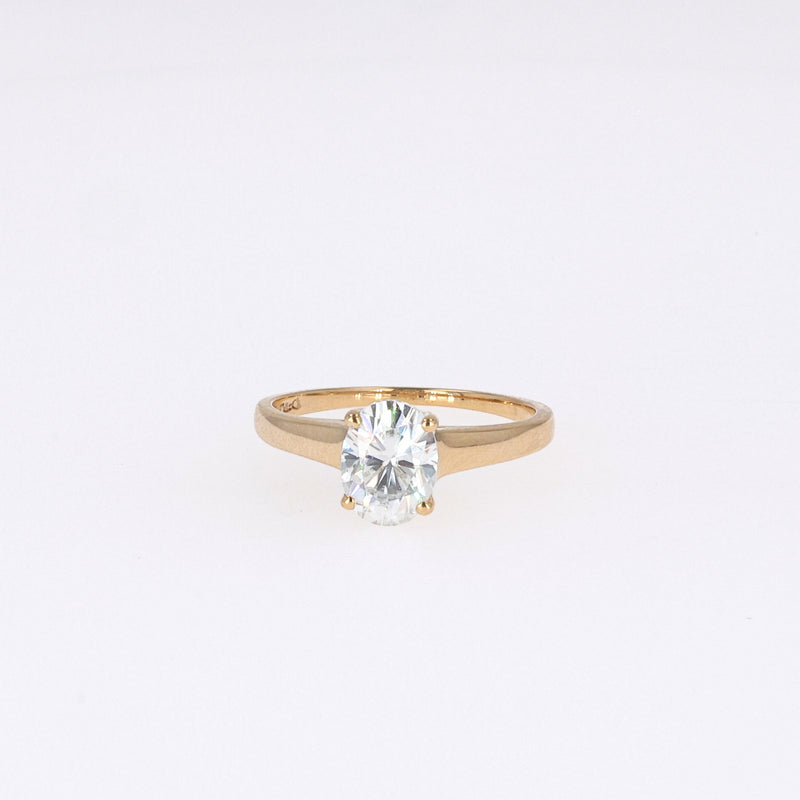 1.50 CTW DEW Oval Near-Colorless Moissanite Solitaire Ring in 14K Yellow Gold