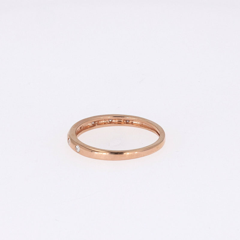 0.11 CTW DEW Round Near-Colorless Moissanite Band in 14K Rose Gold