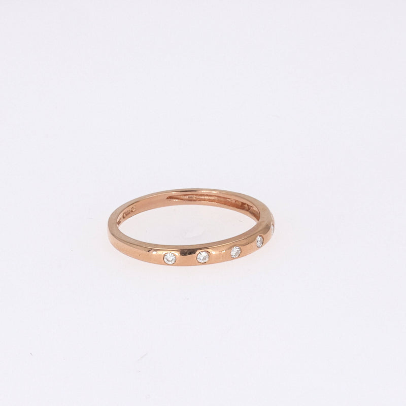 0.11 CTW DEW Round Near-Colorless Moissanite Band in 14K Rose Gold