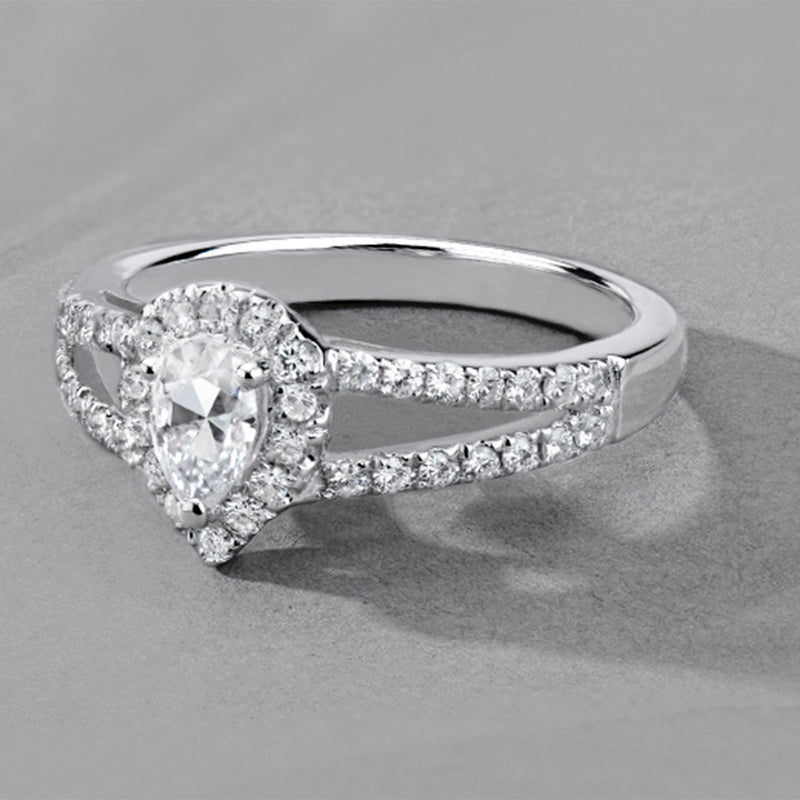 0.96 CTW DEW Pear Near-Colorless Moissanite Accented Split Shank Halo Engagement Ring in 14K White Gold