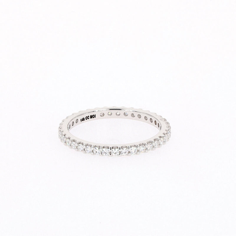 0.57 CTW DEW Round Near-Colorless Moissanite Eternity Ring in 14K White Gold