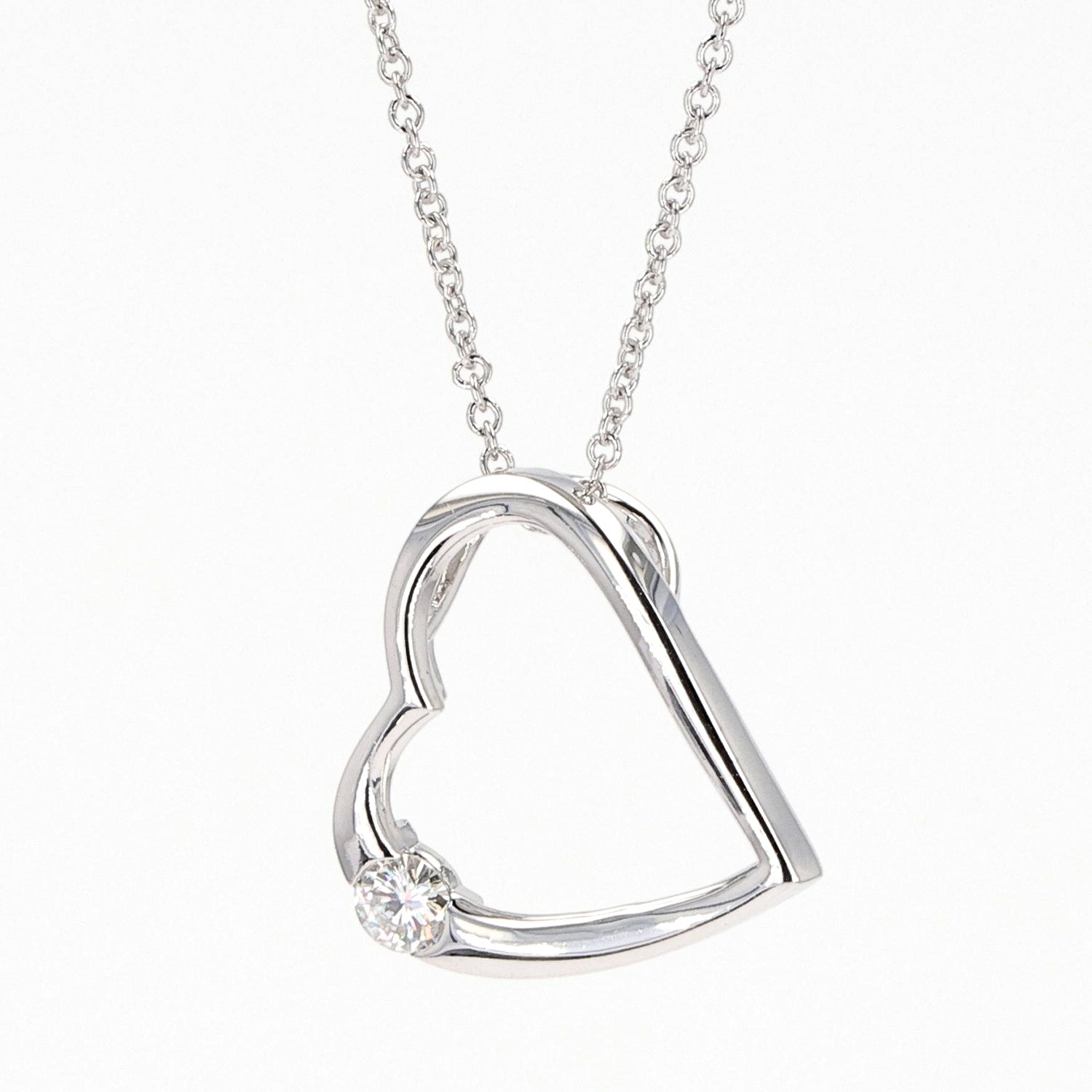0.13 CTW DEW Round  Moissanite Heart Pendant in Sterling Silver