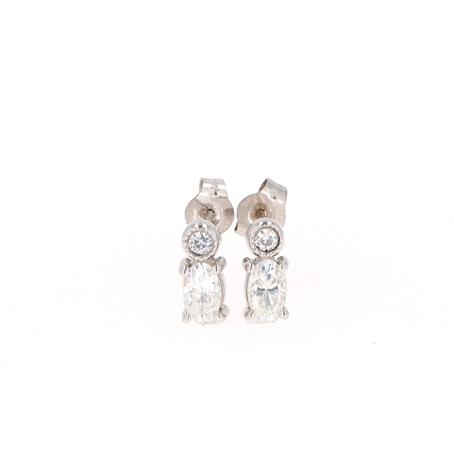 0.58 CTW DEW Oval Near-Colorless Moissanite Fashion Stud Earrings in 10K White Gold