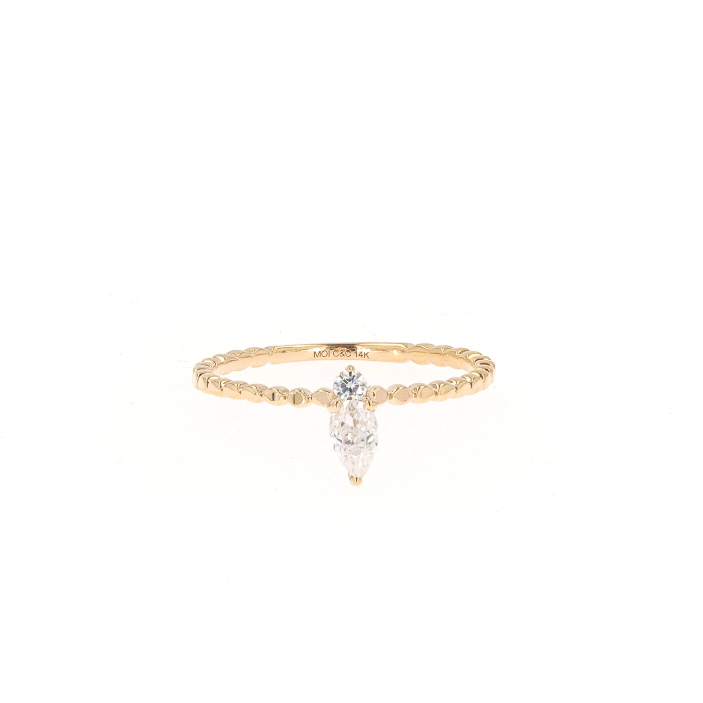 0.24 CTW DEW Pear Near-Colorless Moissanite Stackable Band in 14K Yellow Gold