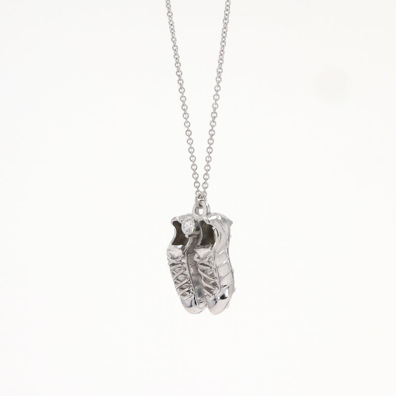 0.10 CTW DEW Round Near-Colorless Moissanite Pendant in Sterling Silver
